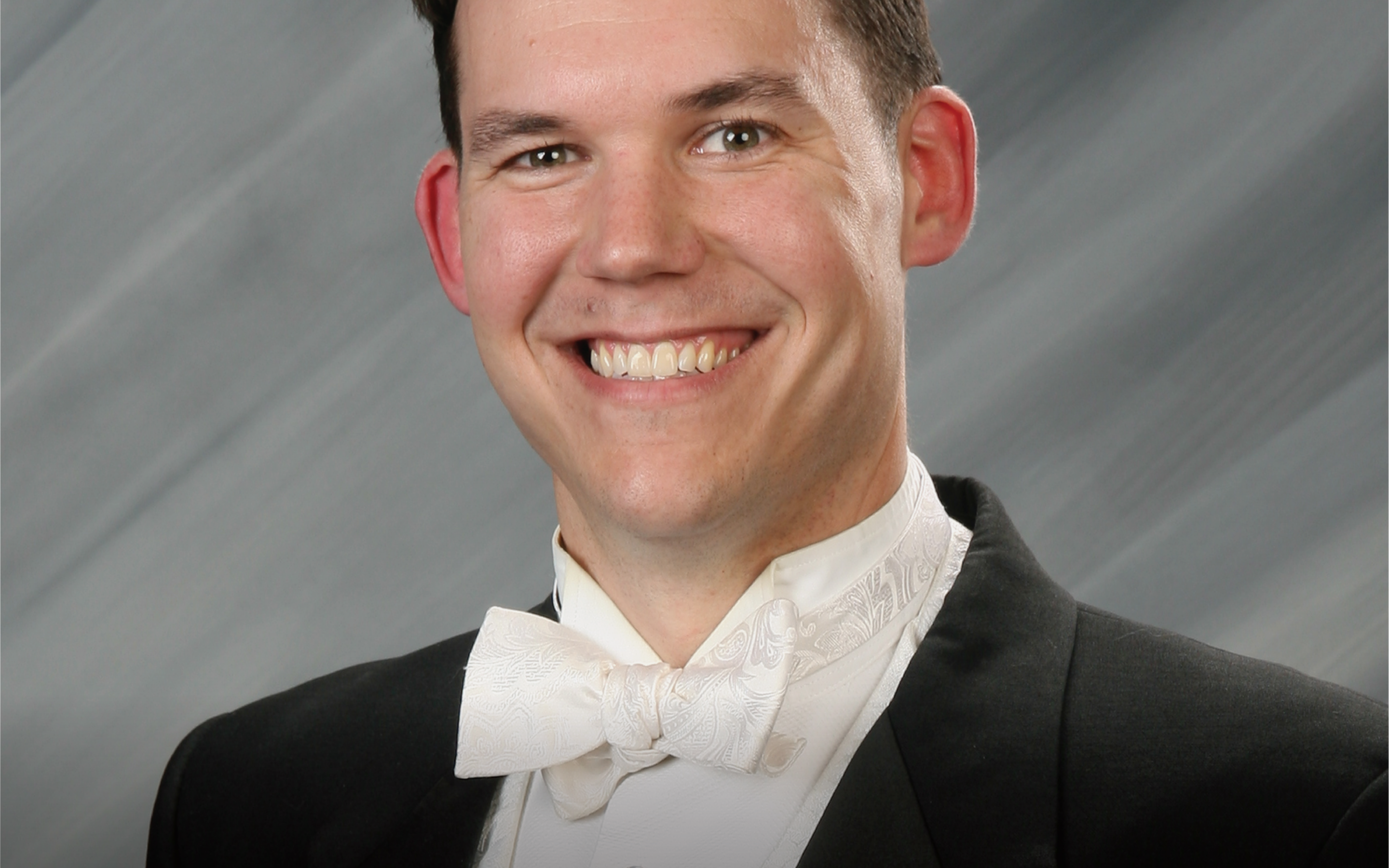 Zack Morton Appointed QCSYE Concert Orchestra Conductor